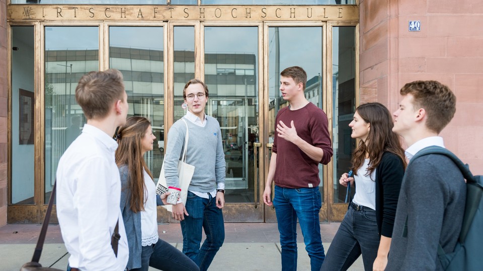 Group of students in front of the main entrance