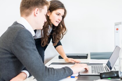 Two students at the laptop