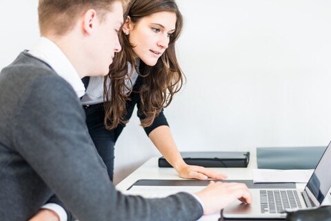 Two students at the laptop