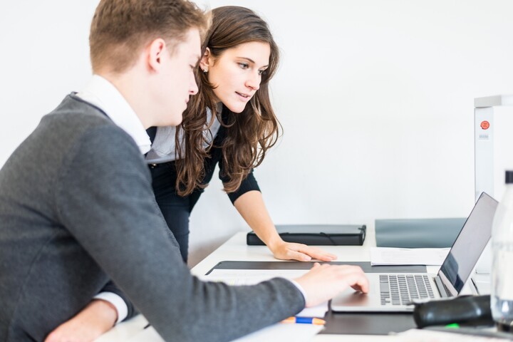 Two students at the laptop