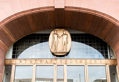Door arch with golden decorations, BWL entrance