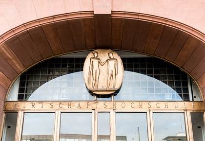 Door arch with golden decorations, BWL entrance